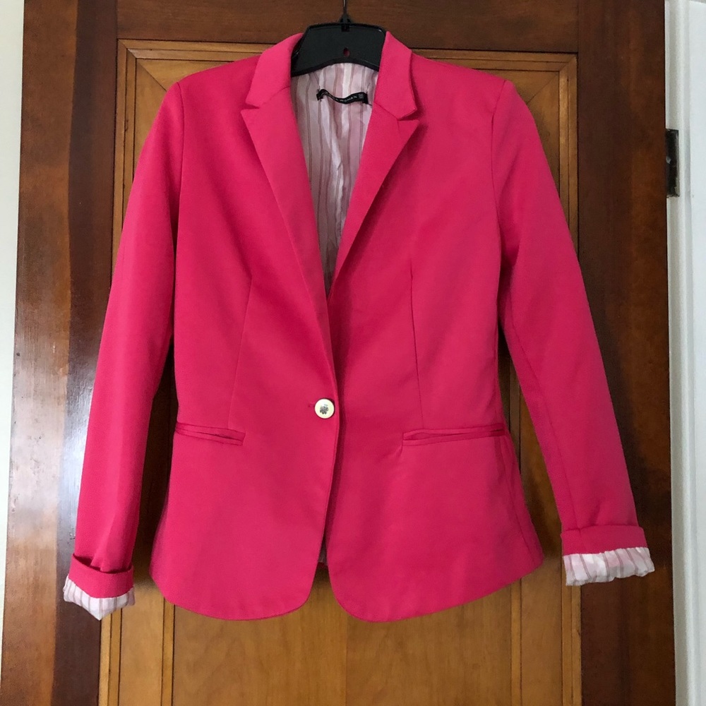 Hot pink blazer.